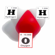 A model of a water molecule with two white pieces attached to one red piece. The white pieces have hydrogen labels from the periodic table and the red piece has an oxygen label.